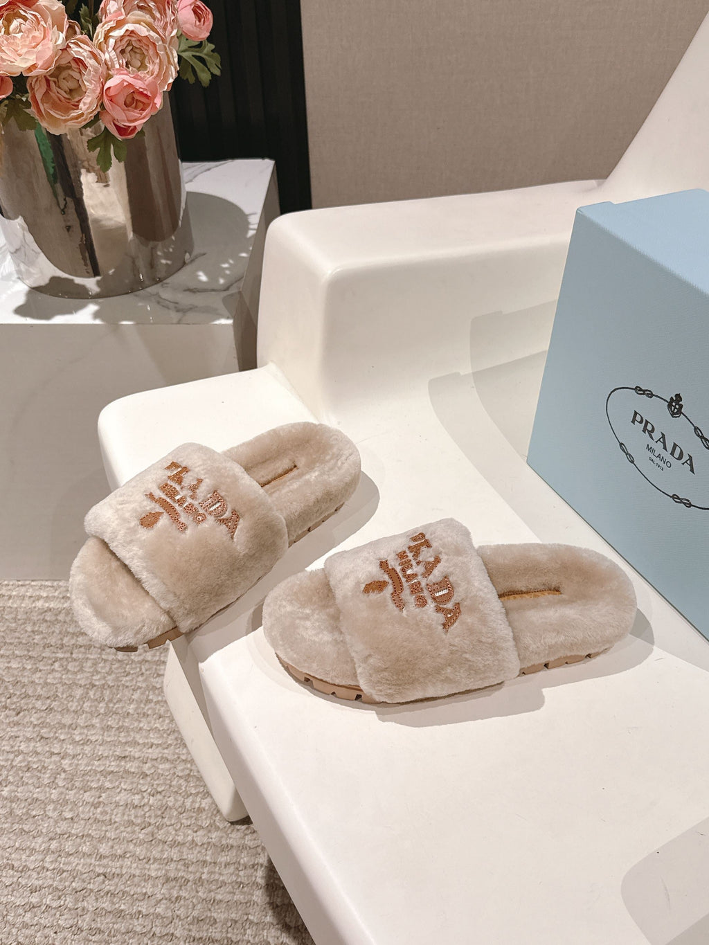 PRADA 25S FLAT MULES IN WARM TAUPE RABBIT FUR